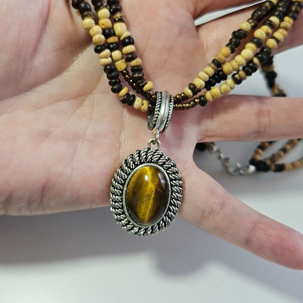 Avon silver tone oval tiger's eye pendant necklace 17"